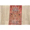 Image 4 : A WOOL HAND KNOTTED GHARAJEH RUG RUNNER.