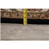 Image 11 : A WOOL HAND KNOTTED FLORAL ORIENTAL AREA RUG.