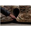 Image 12 : A WOOL HAND KNOTTED FLORAL ORIENTAL AREA RUG.