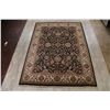 Image 2 : A WOOL HAND KNOTTED FLORAL ORIENTAL AREA RUG.