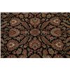 Image 4 : A WOOL HAND KNOTTED FLORAL AREA RUG.
