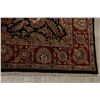 Image 6 : A WOOL HAND KNOTTED FLORAL AREA RUG.