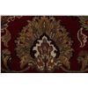Image 7 : A WOOL HAND KNOTTED FLORAL AREA RUG.