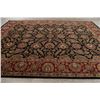Image 9 : A WOOL HAND KNOTTED FLORAL AREA RUG.