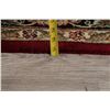 Image 11 : A WOOL HAND KNOTTED FLORAL ORIENTAL AREA RUG.