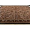 Image 10 : A WOOL HAND KNOTTED TURKISH AREA RUG.