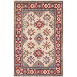 A WOOL HAND KNOTTED KAZAK ORIENTAL AREA RUG.