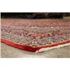 Image 11 : A WOOL HAND KNOTTED FLORAL ORIENTAL AREA RUG.