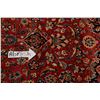 Image 8 : A WOOL HAND KNOTTED FLORAL ORIENTAL AREA RUG.