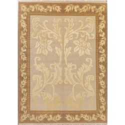 A WOOL HAND KNOTTED FLORAL ORIENTAL AREA RUG.