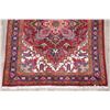 Image 11 : A WOOL HAND KNOTTED ORIENTAL AREA RUG.