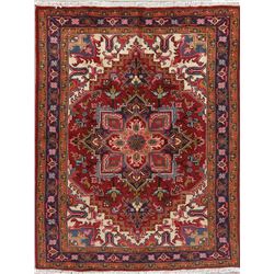 A WOOL HAND KNOTTED ORIENTAL AREA RUG.