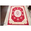 Image 2 : A WOOL HAND KNOTTED FLORAL TURKISH AREA RUG.