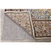 Image 10 : A WOOL HAND KNOTTED FLORAL MEDALLION AREA RUG.