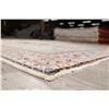 Image 11 : A WOOL HAND KNOTTED FLORAL MEDALLION AREA RUG.