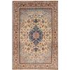 Image 1 : A WOOL HAND KNOTTED FLORAL MEDALLION AREA RUG.
