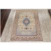 Image 2 : A WOOL HAND KNOTTED FLORAL MEDALLION AREA RUG.