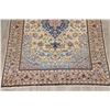 Image 5 : A WOOL HAND KNOTTED FLORAL MEDALLION AREA RUG.