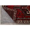 Image 10 : A WOOL HAND KNOTTED LORI AREA RUG.