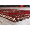 Image 11 : A WOOL HAND KNOTTED LORI AREA RUG.