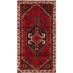 A WOOL HAND KNOTTED LORI AREA RUG.
