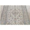 Image 12 : A WOOL HAND KNOTTED FLORAL ORIENTAL AREA RUG.