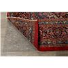 Image 10 : A WOOL HAND KNOTTED FLORAL ORIENTAL AREA RUG.