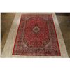Image 2 : A WOOL HAND KNOTTED FLORAL ORIENTAL AREA RUG.