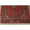 Image 5 : A WOOL HAND KNOTTED FLORAL ORIENTAL AREA RUG.