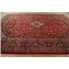 Image 9 : A WOOL HAND KNOTTED FLORAL ORIENTAL AREA RUG.