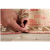Image 11 : A WOOL HAND KNOTTED OUSHAK ORIENTAL RUG.