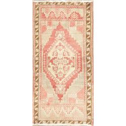 A WOOL HAND KNOTTED OUSHAK ORIENTAL RUG.