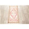 Image 2 : A WOOL HAND KNOTTED OUSHAK ORIENTAL RUG.