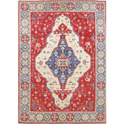 A WOOL HAND KNOTTED KAZAK ORIENTAL AREA RUG.