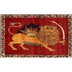 A WOOL HAND KNOTTED PICTORIAL AREA RUG.