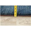 Image 12 : A WOOL HAND KNOTTED GABBEH AREA RUG.