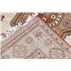Image 10 : A WOOL HAND KNOTTED MEDALLION AREA RUG.