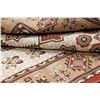 Image 12 : A WOOL HAND KNOTTED MEDALLION AREA RUG.