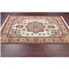 Image 6 : A WOOL HAND KNOTTED MEDALLION AREA RUG.