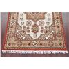 Image 9 : A WOOL HAND KNOTTED MEDALLION AREA RUG.
