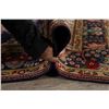 Image 12 : A WOOL HAND KNOTTED FLORAL MEDALLION AREA RUG.