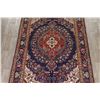 Image 3 : A WOOL HAND KNOTTED FLORAL MEDALLION AREA RUG.