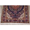 Image 5 : A WOOL HAND KNOTTED FLORAL MEDALLION AREA RUG.