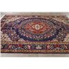 Image 9 : A WOOL HAND KNOTTED FLORAL MEDALLION AREA RUG.