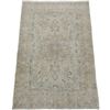 Image 2 : A WOOL HAND KNOTTED FLORAL AREA RUG.