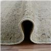 Image 8 : A WOOL HAND KNOTTED FLORAL AREA RUG.