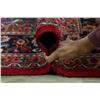 Image 11 : A WOOL HAND KNOTTED FLORAL ORIENTAL AREA RUG.