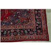 Image 6 : A WOOL HAND KNOTTED FLORAL ORIENTAL AREA RUG.