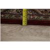 Image 11 : A WOOL HAND KNOTTED FLORAL ORIENTAL AREA RUG.