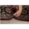 Image 12 : A WOOL HAND KNOTTED FLORAL ORIENTAL AREA RUG.